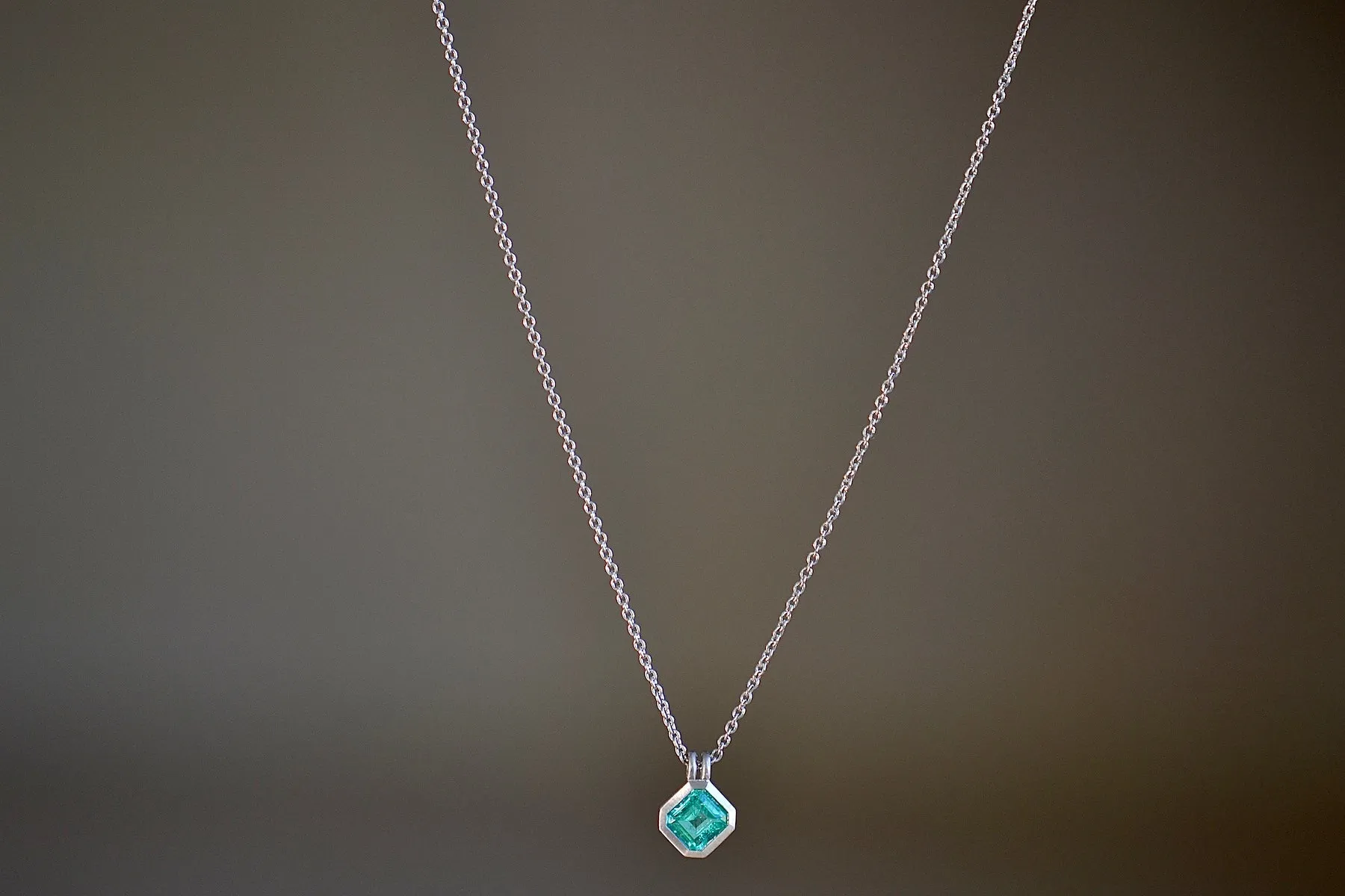 Duo Bale Emerald Pendant in Platinum