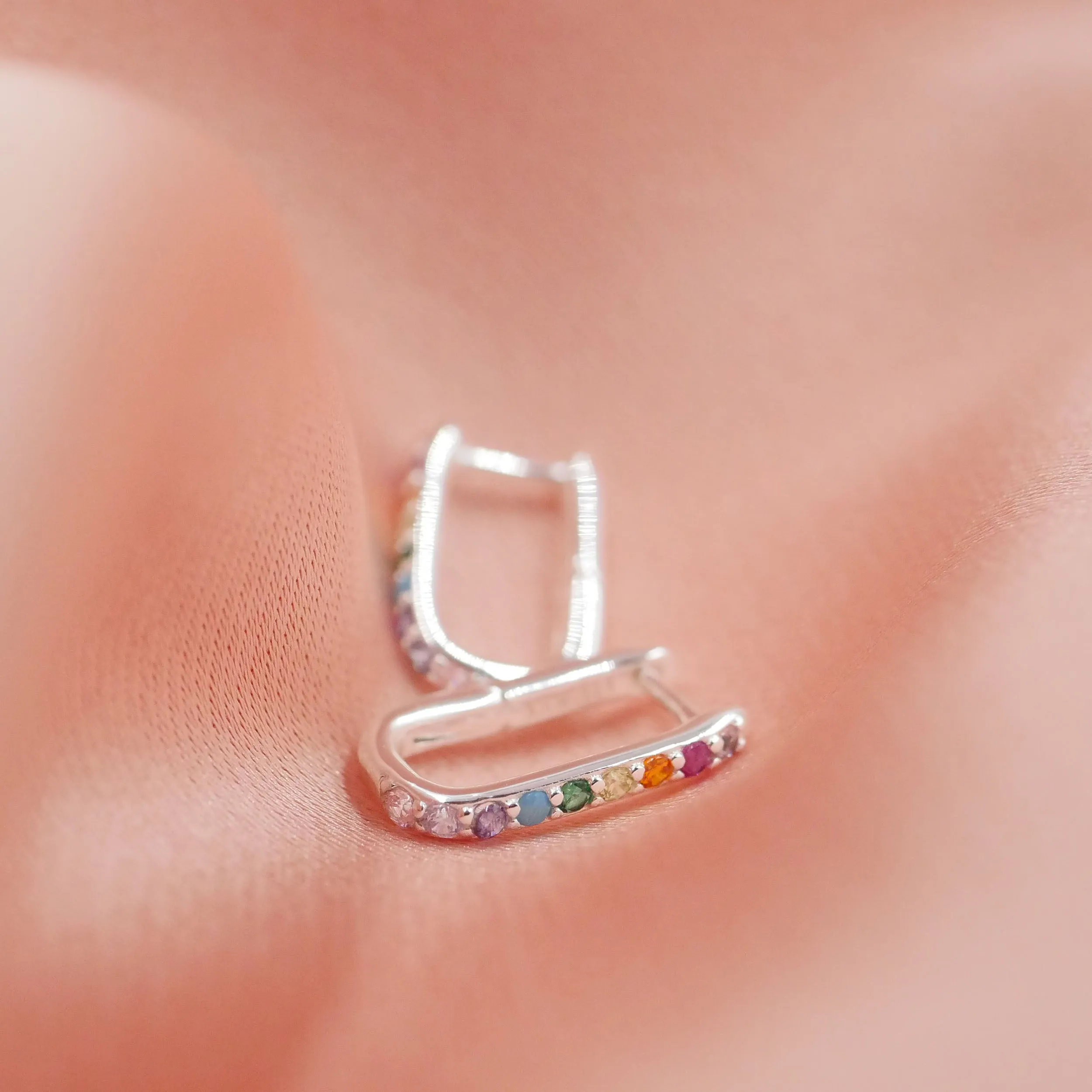 Elongated Huggie Hoops with Rainbow Pave