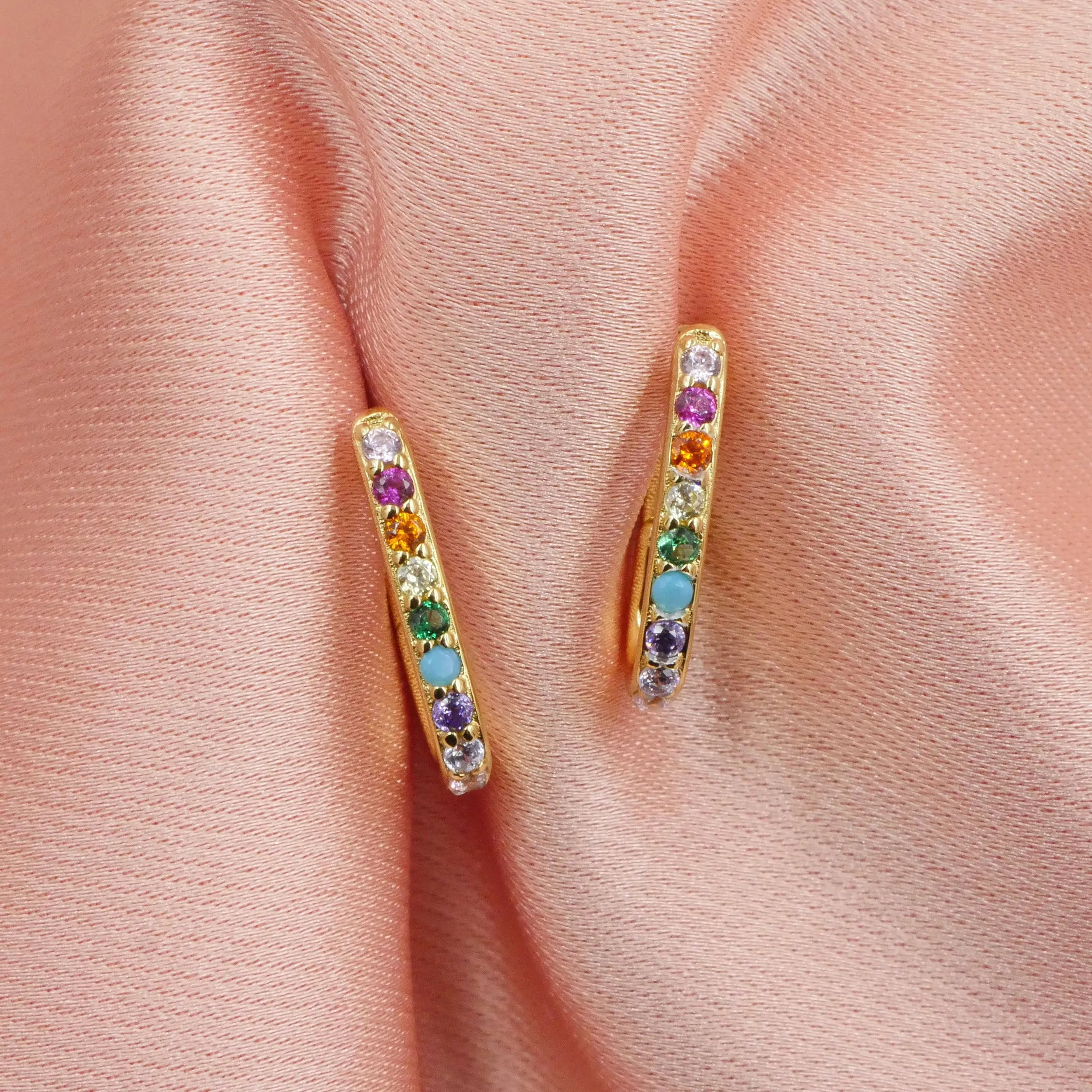 Elongated Huggie Hoops with Rainbow Pave