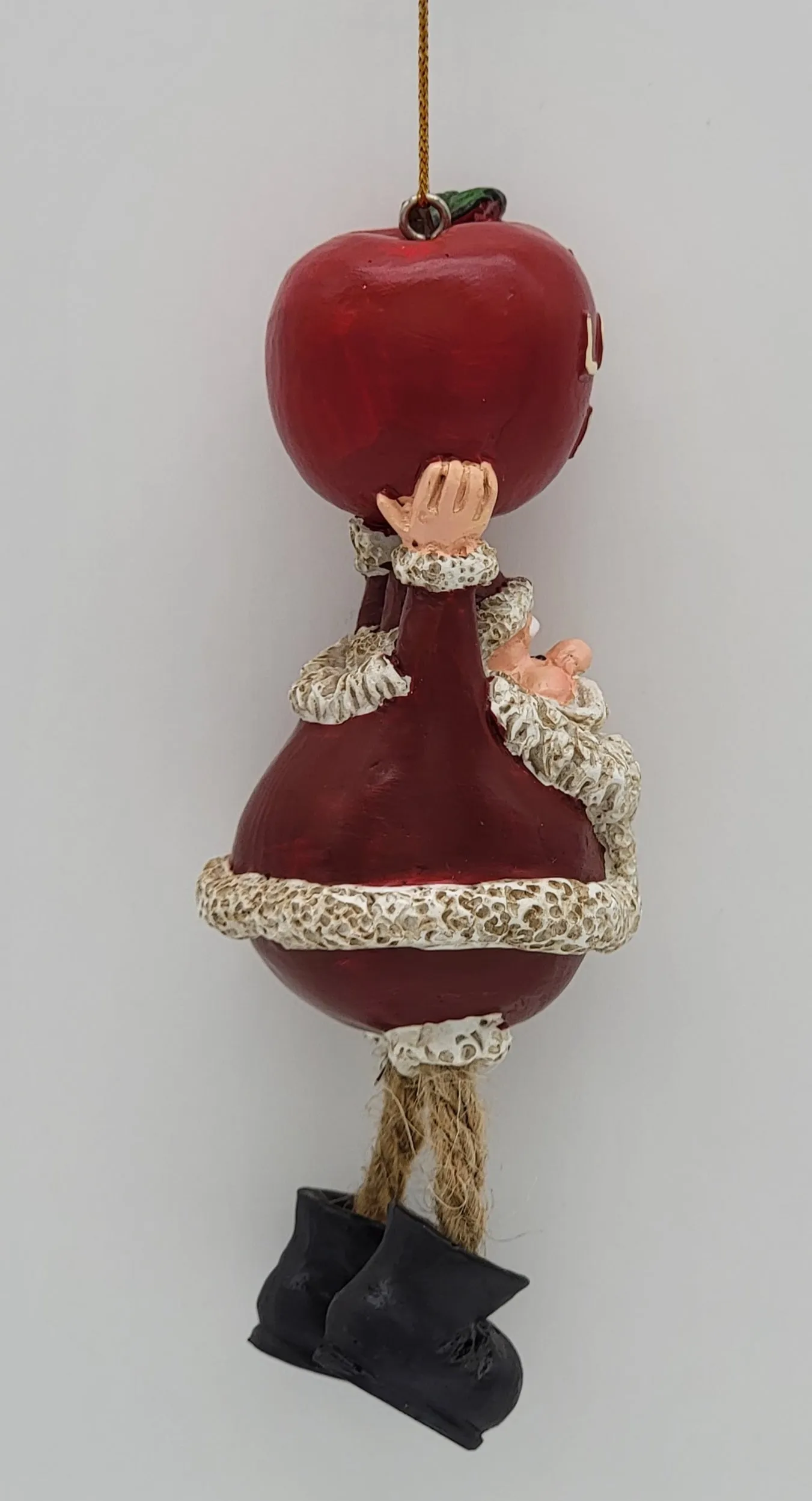 Santa Holding A Big Apple Christmas Ornament